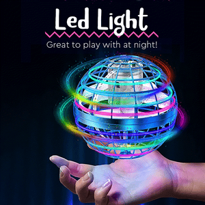 Galaxy Lights Flying Magic Orb glowing with colorful LED lights above hand at night