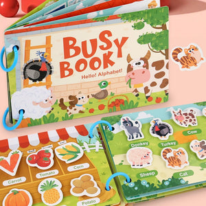 Child playing with early education busy book featuring reusable stickers and interactive puzzles for ages 4-6