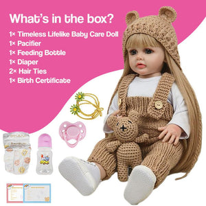Real-Feel Baby Doll with lifelike silicone skin, blonde hair, beige knitted outfit, and full care set including pacifier, feeding bottle, diaper, hair ties, and birth certificate.