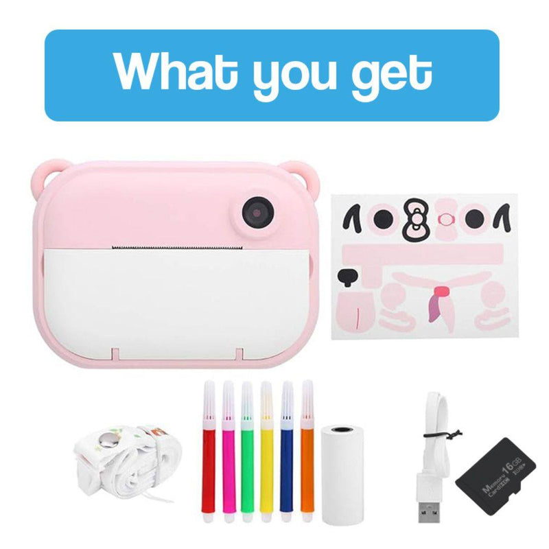 Pink kid instant print camera with markers, USB cable, thermal paper roll, memory card, and decorative stickers for creative photography gift.