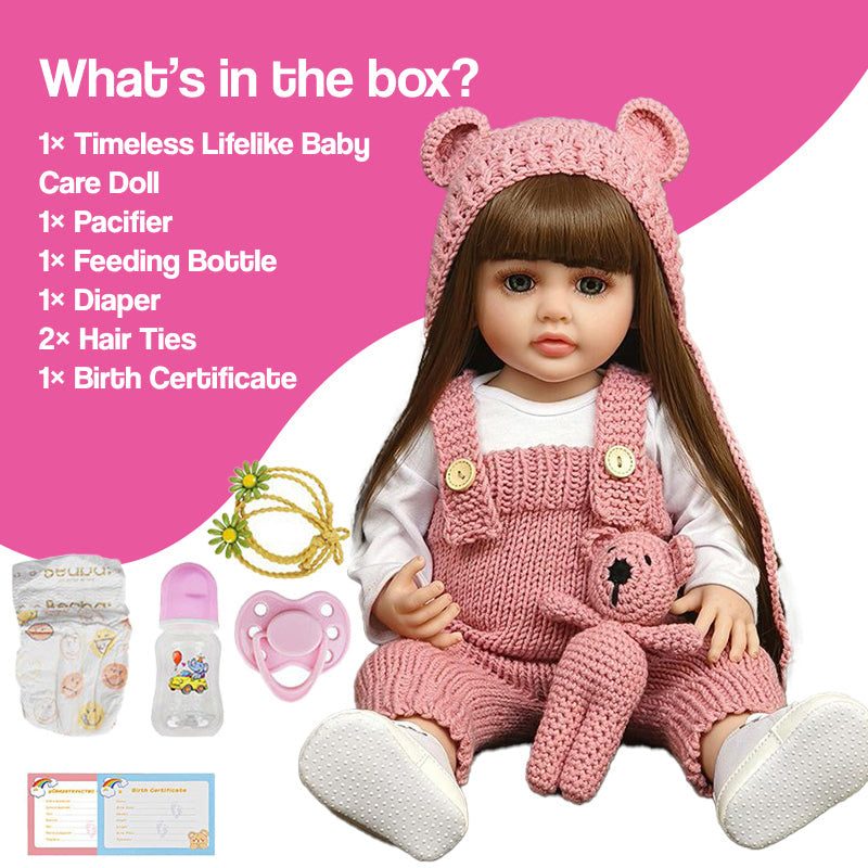 Real-Feel Baby Doll with lifelike silicone skin, brunette hair, pink knit outfit, and full care set including pacifier, bottle, diaper, hair ties, and birth certificate.