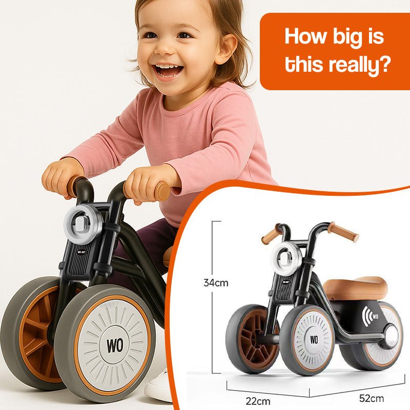 Toddler riding Tiny Biker Anti-Tip Light & Sound Motorcycle with three wheels and comfortable seat, child toy for ages 1-6