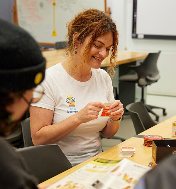 Sarah testing a card game with the team